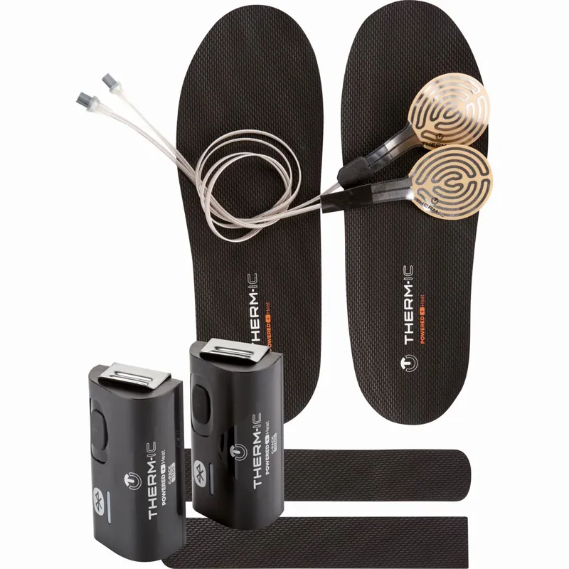 Battery powered outlet heated insoles
